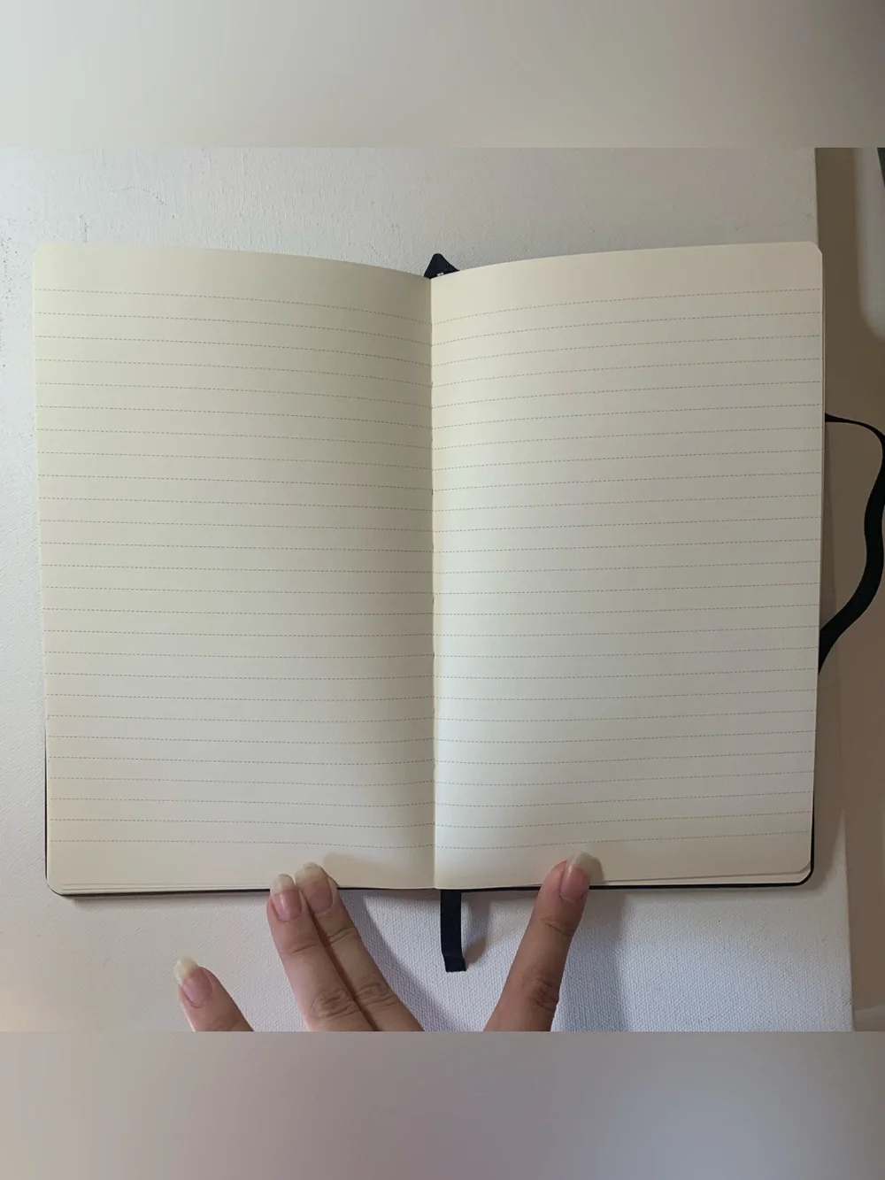 Black leather notebook with elastic band closure